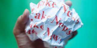 U.S. Military Aims at Fake News As Bad Guys Stay Steps Ahead Fake news against blue green background